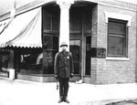 Link to Image Titled: Officer Rogers in front of Stock Yards State Bank