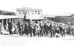 Link to Image Titled: Service Men Ascending Ramp to Board Train